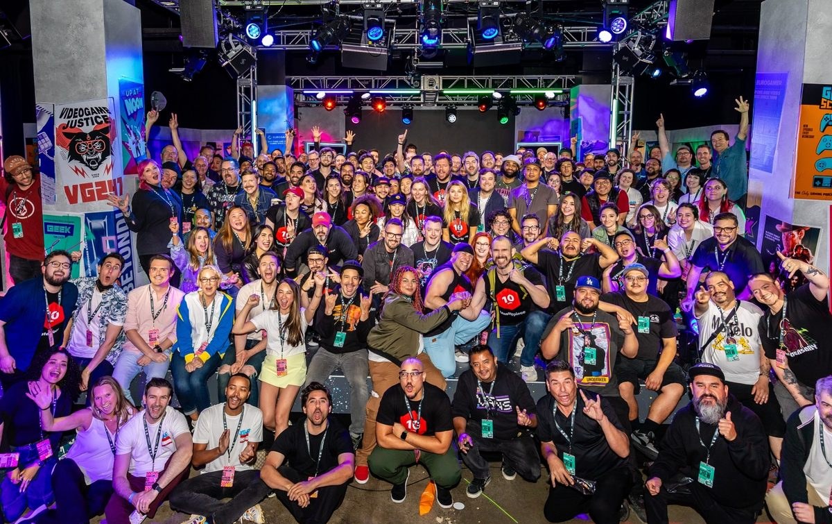 A crowd posing for a group photo at Magic Box Event Campus